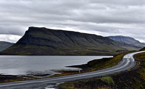 Scenic view of mountain road against sky