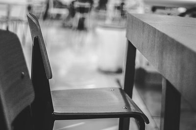 Close-up of empty chairs and table in restaurant