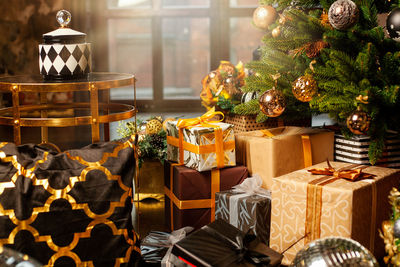 Illuminated christmas tree on table