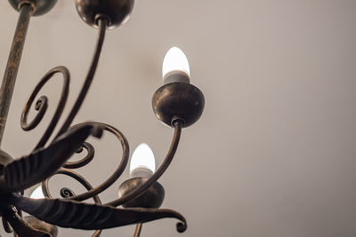 Retro styled chandelier on ceiling, closeup