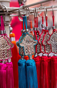 Close-up of multi colored souvenirs for sale at shop