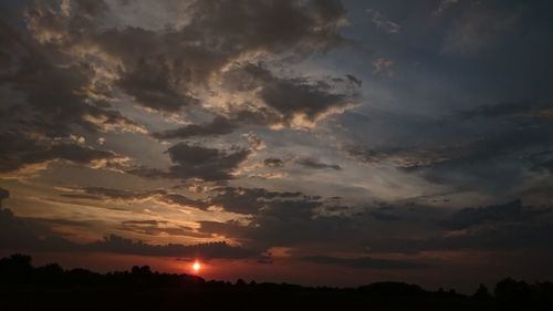 Scenic view of landscape at sunset