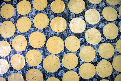 Khichiya papdi papad rice flour crackers or papadom drying in the sun, chawal ke papad