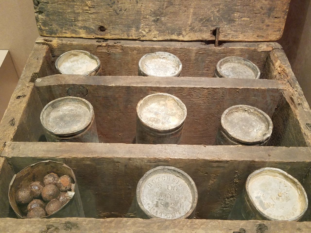 HIGH ANGLE VIEW OF OBJECTS ON SHELF IN KITCHEN