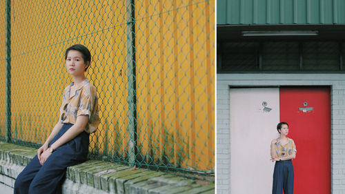 Portrait of a young woman in front of building