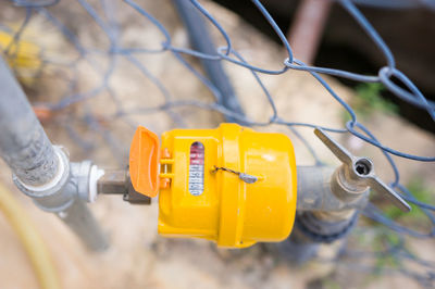 Selective focus image with water pipe meter.