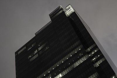 Low angle view of skyscraper against clear sky