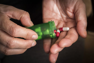 Close-up of hand holding baby toy