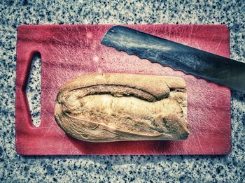 High angle view of bread on cutting board