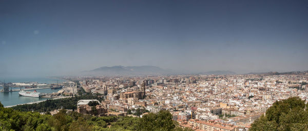 Aerial view of town against sky