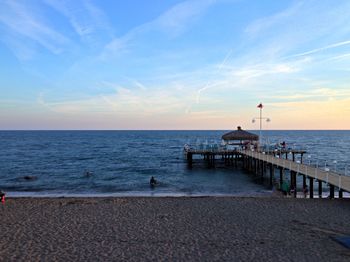 Scenic view of sea against blue sky