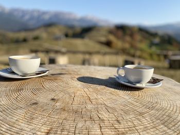 Close-up of coffee cup on table