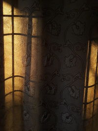 Close-up of curtain on wall