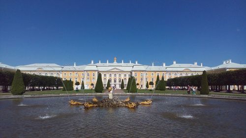 View of historical building against clear blue sky