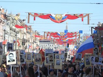 Group of people on street in city