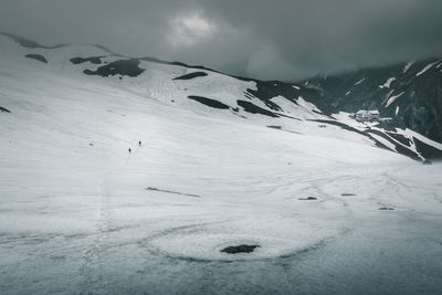 Scenic view of snowcapped mountain against sky