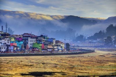 Scenic view of sea against cloudy sky