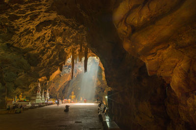 People walking in cave