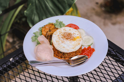 High angle view of fried rice served on table