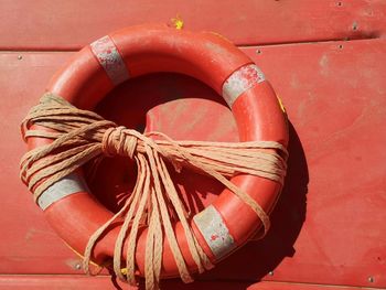 Close-up of rope and life buoy