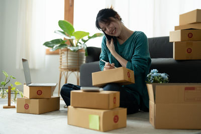 Side view of man with boxes