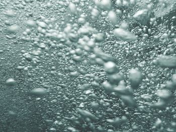 Full frame shot of water drops on glass