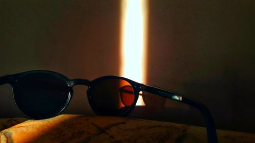 Close-up of sunglasses on table at home