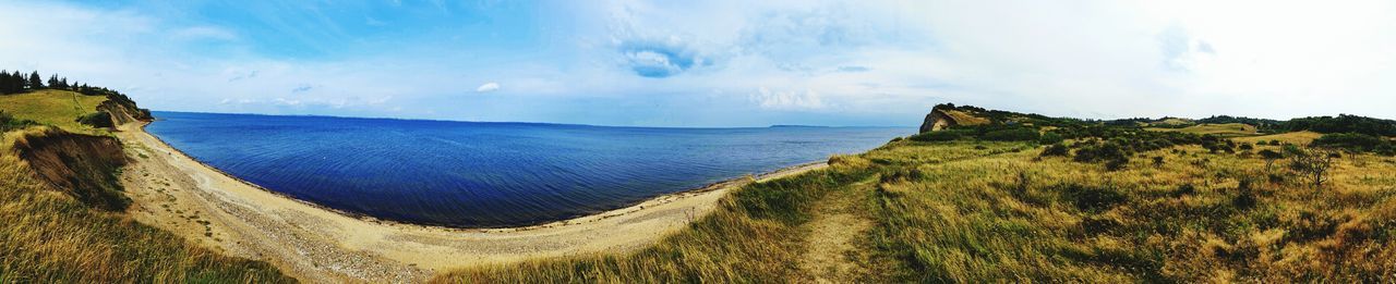 Scenic view of calm sea against sky