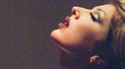 Close-up portrait of woman with eyes closed