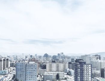 High angle view of buildings against sky