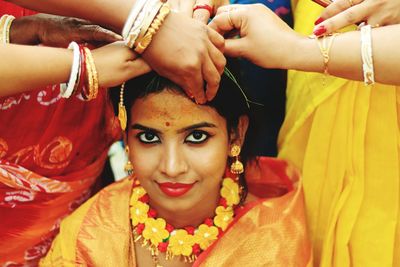 Portrait of young woman in traditional clothing