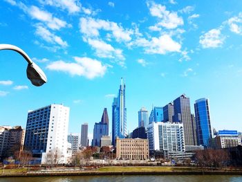 View of skyscrapers against blue sky