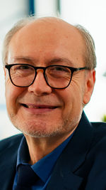 Close-up portrait of smiling young man