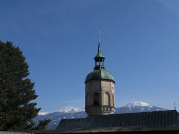 Low angle view of building against blue sky