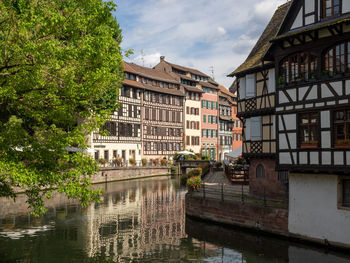 Canal lined with timbered house in strasbourg, france