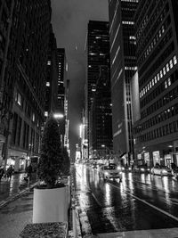 Illuminated buildings in city at night