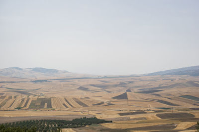 Scenic view of desert against clear sky