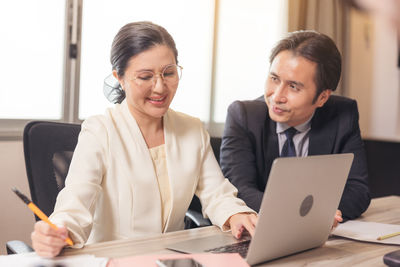 Business colleagues working at office