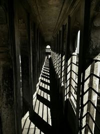 Empty walkway along buildings