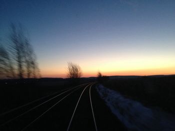 Railroad track at sunset