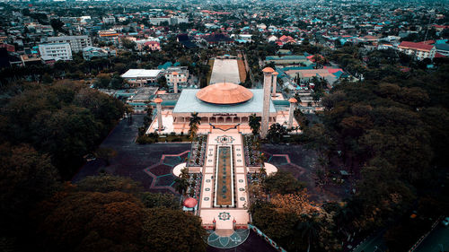 High angle view of crowd by buildings in city