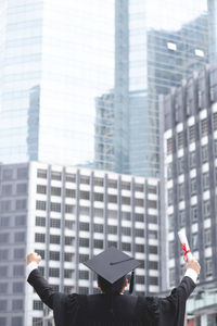 Graduates of the university,of graduate holding hats along with success, education 