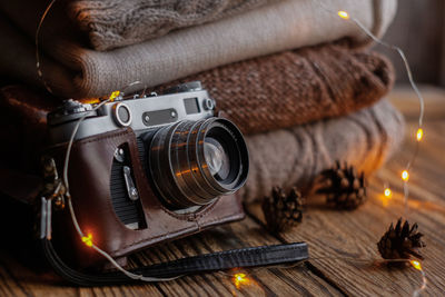 Close-up of camera on table