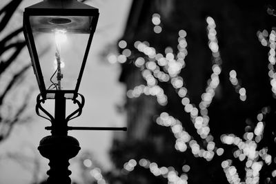 Street lamp against defocused lights