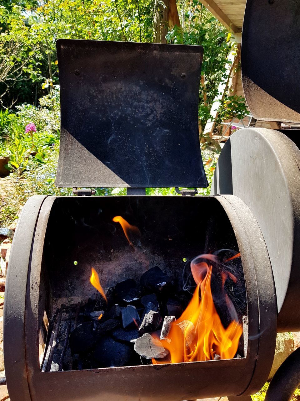 HIGH ANGLE VIEW OF BONFIRE ON BARBECUE GRILL