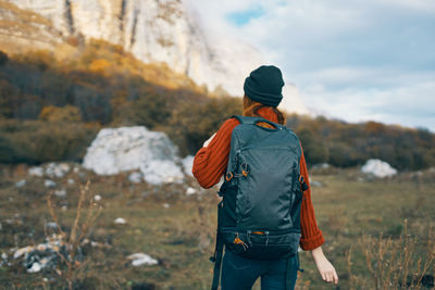 Rear view of man looking at mountain