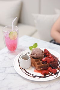 Close-up of dessert served on table