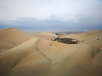 Scenic view of desert against sky