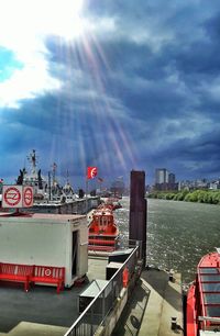 View of city against cloudy sky