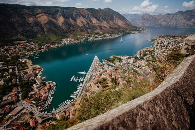 High angle view of lake amidst mountains